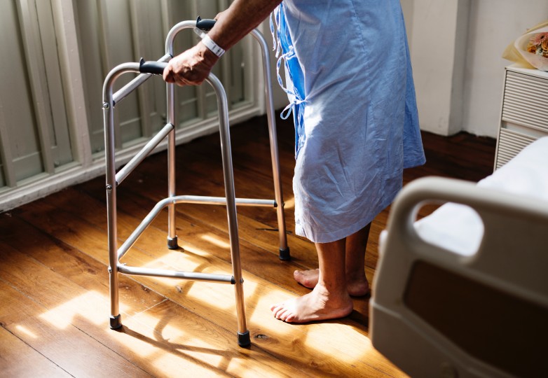 Patient using walker Patient using walker