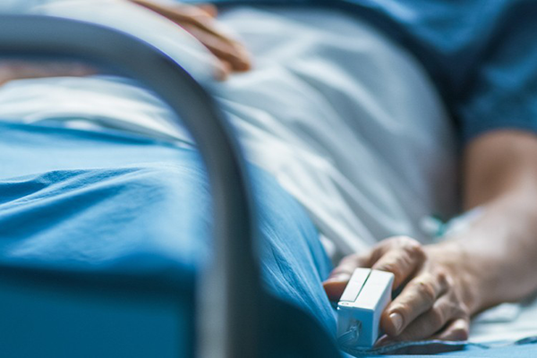 Patient in hospital bed